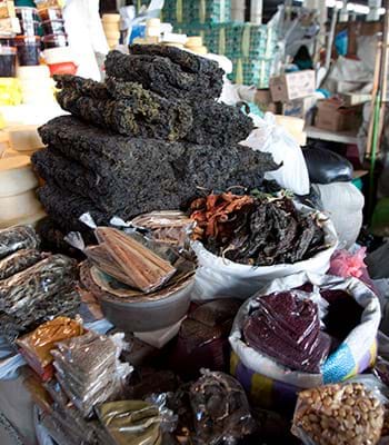 Variety of typical grains of the region in the Mercado San Pedro